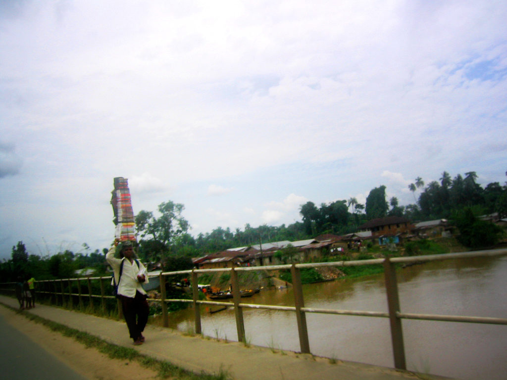 Book Salesman on bridge in Oloibiri., Baylesa State, Nigeria.
