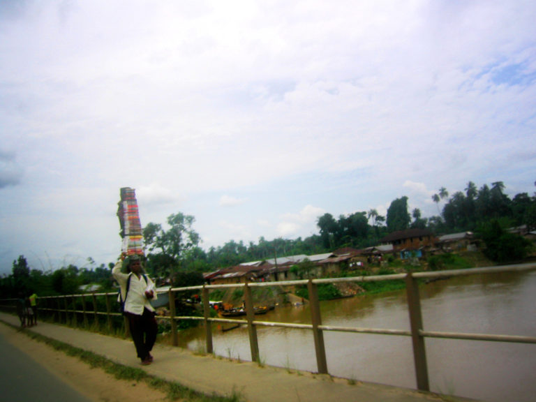 Book Salesman on bridge in Oloibiri., Baylesa State, Nigeria.