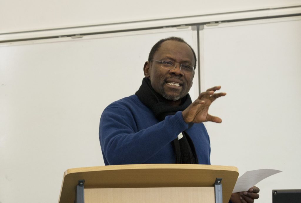 Professor Abdul Raufu Mustapha lecturing