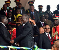 Newly inaugurated President John Pombe Magufuli greets President of Zimbabwe Robert Mugabe.