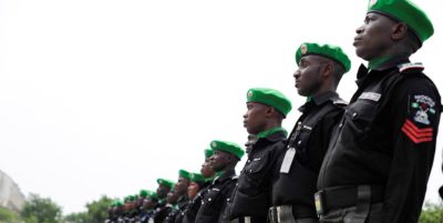 Nigerian AMISOM police officers standing in a parade during a medal award ceremony on December 5, 2014 at Mogadishu Stadium, Somalia. AU UN IST Photo / Ilyas Ahmed